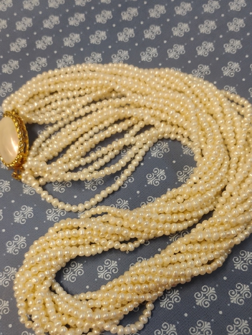 Vintage Cream Multi-Strand Pearl Necklace with Gold Accent